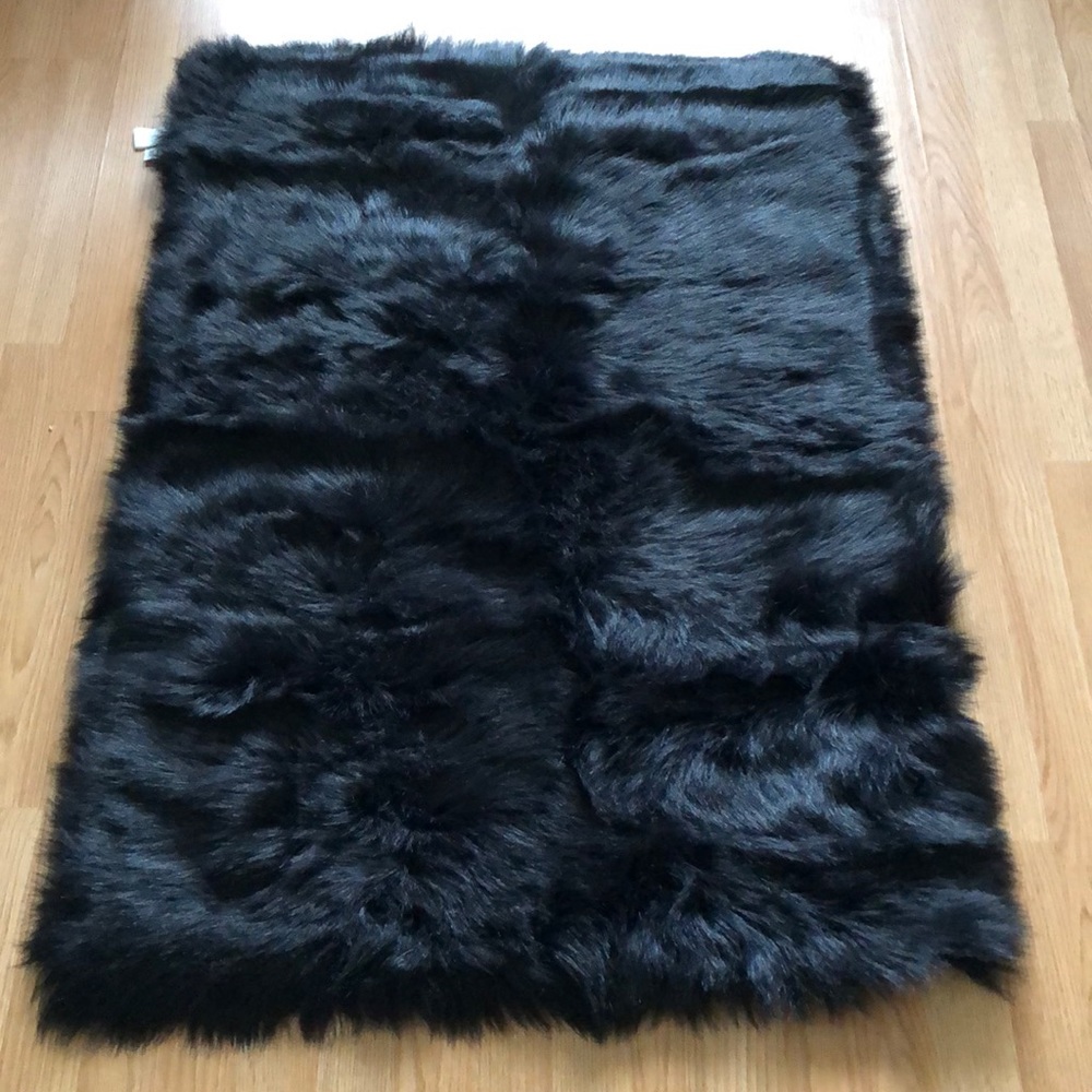 Black faux fur carpet